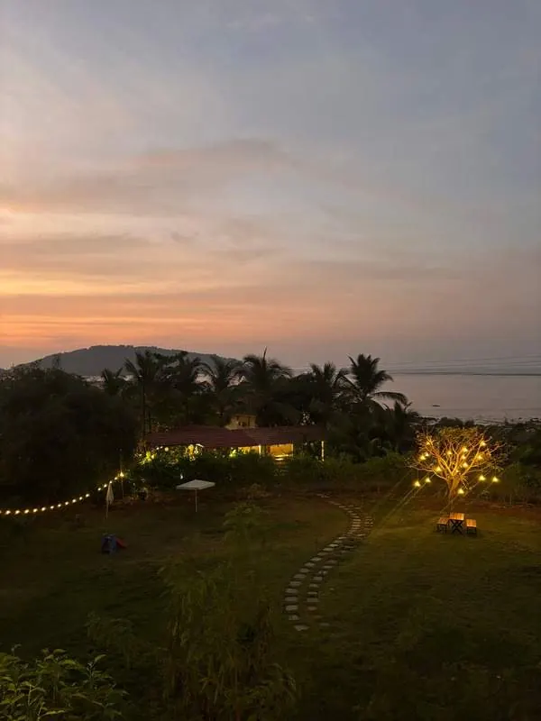 The Seascape resort lit up at dusk on the Korlai coast